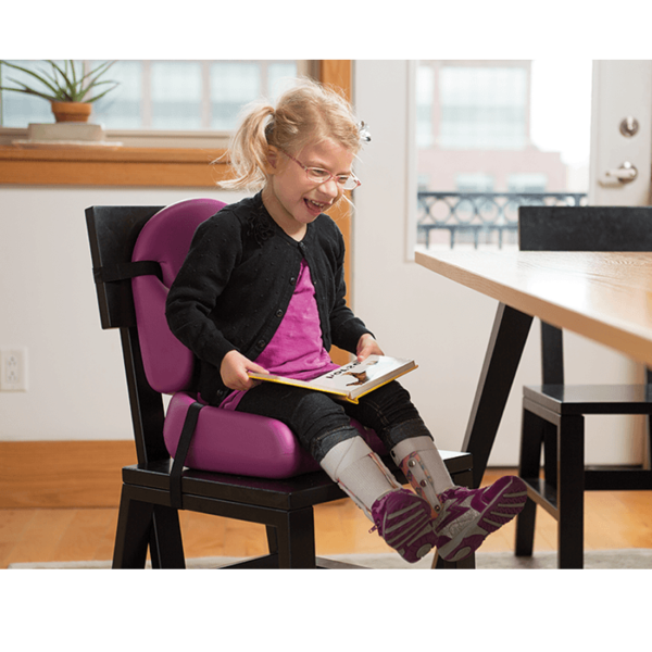 A girl sit on the liner which is attached to a regular chair